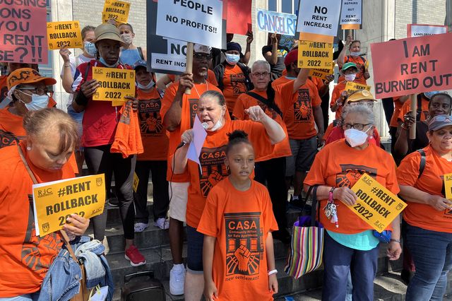 Tenant advocates with Community Action for Safe Apartments rally against a proposed rent increase outside the Rent Guideline Board's final public hearing on Wednesday in the Bronx.